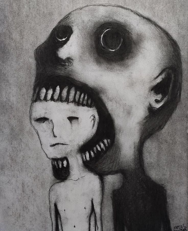 a drawing of an alien head with two faces