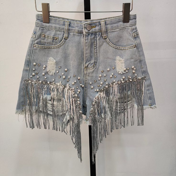 Bohemian Party Bottoms With Tassels, Spring Festival Shorts With Fringe, Summer Jean Shorts With Rhinestone Fringe, Embellished Jean Shorts For Summer, Summer Party Bottoms With Tassels, Bohemian Embellished Bottoms For Festival, Summer Party Bottoms With Beaded Fringe, Summer Party Shorts With Fringe, Embellished Party Shorts For Summer