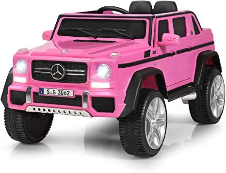 a pink toy truck with lights and wheels on it's front tire, in the shape of a mercedes g - class