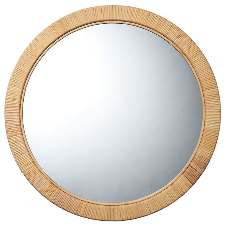 a round wooden mirror on a white background