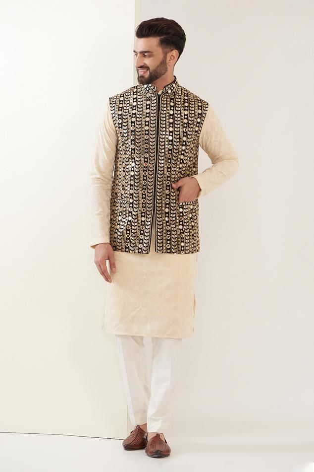 Black Nehru jacket with mirror embroidery and front pockets.
Components: 1
Pattern: Embroidered
Type Of Work: Mirror
Neckline: Band
Sleeve Type: Sleeveless
Fabric: Georgette
Color: Black
Other Details: 
Note: Pant and kurta worn by the model is not for sale
Occasion: Sangeet - Aza Fashions Black Nehru Jacket, Nehru Jacket For Men, Mirror Embroidery, Nehru Jacket, Nehru Jackets, Jacket For Men, Mirror Work, Jackets Online, Aza Fashion