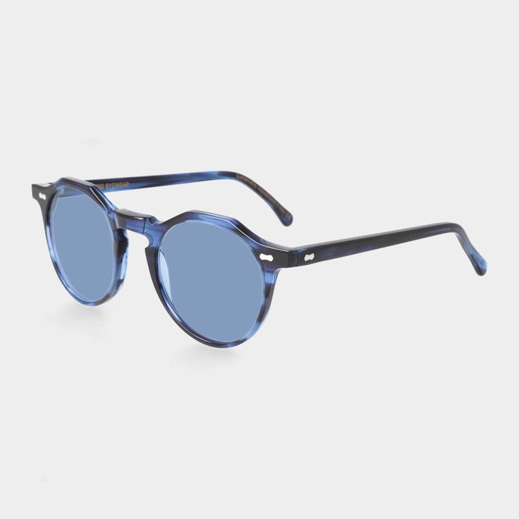 Sunglasses Unisex TBD Eyewear Lapel Ocean | Blue. Lapel Ocean sunglasses exude timeless elegance with ocean blue hues and impeccable Italian craftsmanship, suitable for various face types with a touch of sophistication. Lens: 100% UV protection. Filter: Category 2 Face Types, Blue Sunglasses, Italian Craftsmanship, Unisex Sunglasses, Ocean Blue, Blue Hues, Blue Ocean, Uv Protection, Timeless Elegance