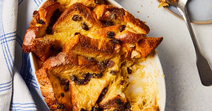 a white plate topped with bread and raisins