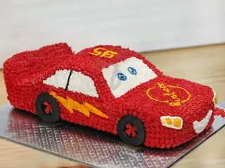 a cake made to look like a red car