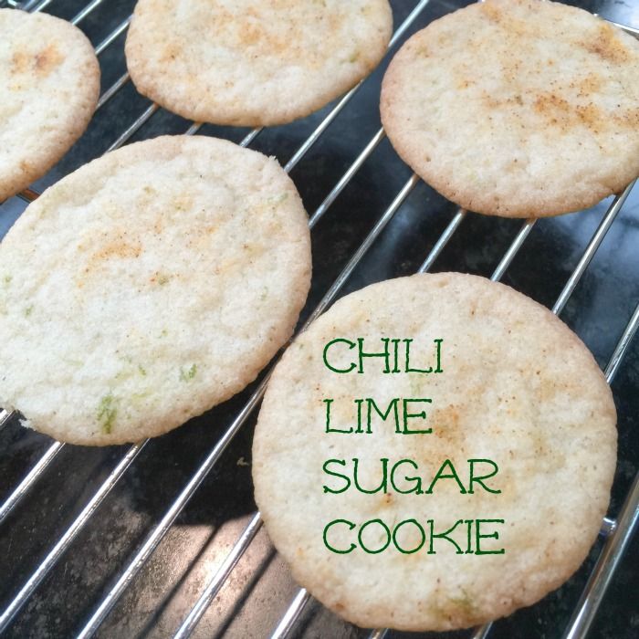 some cookies that are sitting on a cooling rack with the words chili lime sugar cookie