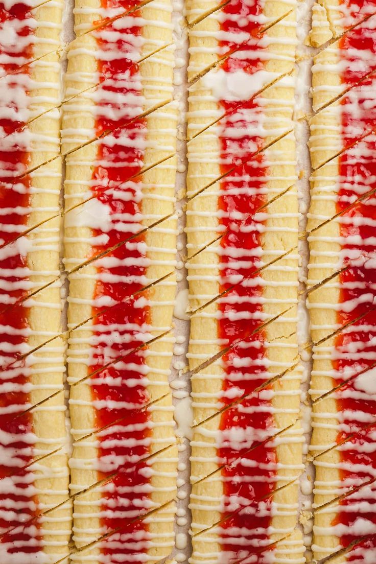 red and white food is being prepared on a tray