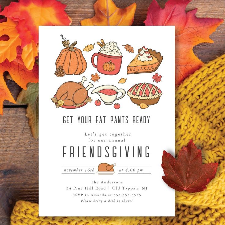 a card with an image of autumn food and leaves on it, next to a knitted hat