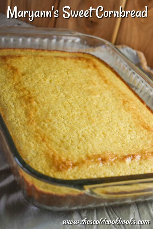 a casserole dish is sitting on a table with the words maryann's sweet cornbread