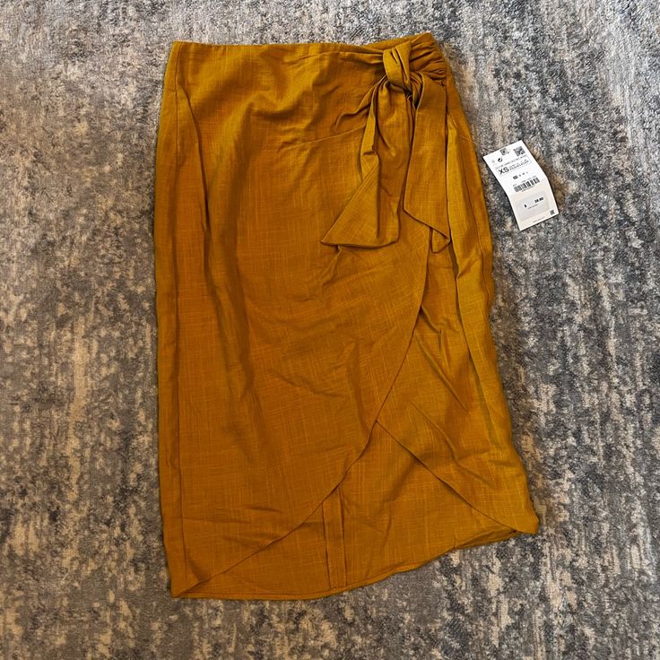 Brand New Mustard Yellow Zara Skirt. Never Been Worn, Tags Still On. Nice Detail On The Front, Zipper On The Back Gold Midi Skirt For Summer, Gold Long Skirt For Summer, Yellow Skirt For Workwear In Fall, Casual Wrap Pencil Skirt For Spring, Casual Yellow Zara Skirt, Casual Mustard Skirt, Yellow Midi Skirt For Work, Casual Yellow Skirt For Fall, Yellow Pencil Skirt For Spring