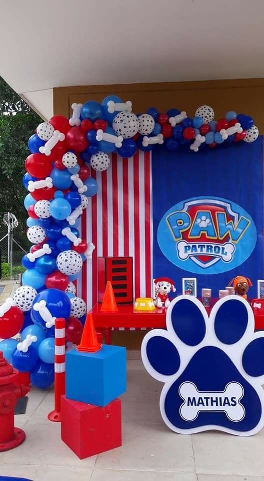 a paw patrol birthday party with balloons and decorations