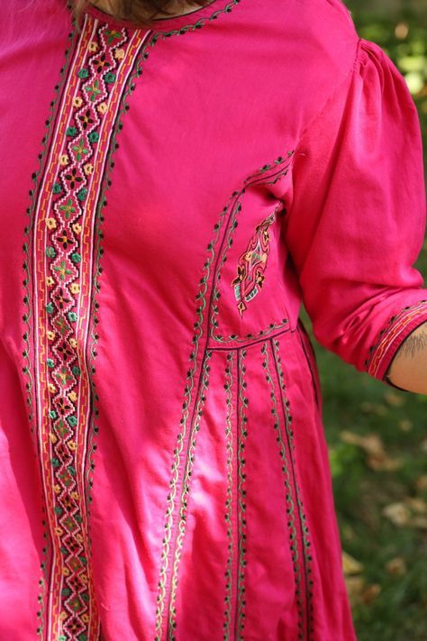 Traditional Long Sleeve Kurta With Embroidered Cuffs, Anarkali Dress With Embroidered Border And Long Sleeves, Folk Style Long Sleeve Dress With Embroidered Border, Long Sleeve Anarkali Dress With Embroidered Border, Long Sleeve Folk Dress With Embroidered Border, Traditional Tunic Embroidered Dress, Traditional Embroidered Dress With Sleeves For Festival, Traditional Embroidered Dress With Embroidered Sleeves For Festival, Festive Long Sleeve Folk Dress