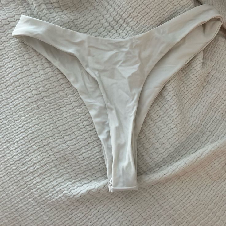 Brand New Never Worn White High-Waist Bikini Bottoms. No Flaws And Size Small! White Stretch Beachwear Bottoms, White Stretch Bottoms For Pool, White Stretch High-waist Swimwear, White High-waisted Stretch Swimwear, White Beach Bottoms In Brief Style, White Beach Brief Bottoms, White Brief Bottoms For Beach, White Beach Bottoms, White Stretch Swimming Bottoms