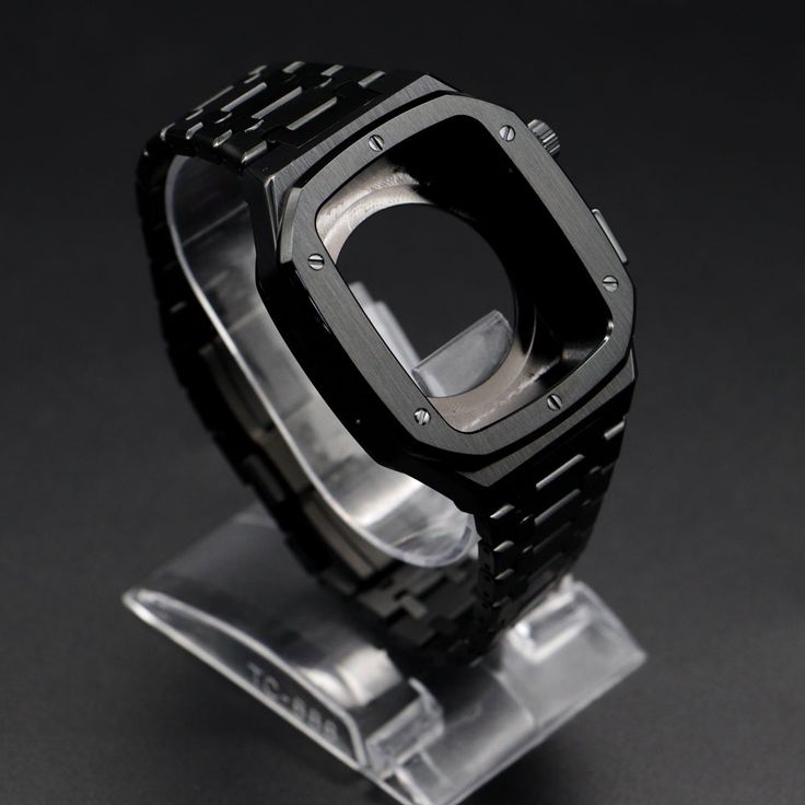 FORTIFY YOUR APPLE WATCH Fully protect your Apple Watch against all damage and scratches with the Titan Case. The 316L stainless steel case transforms your Apple Watch into the perfect blend of luxury, technology, and protection. BEYOND ORDINARY The Titan Case allows you to transform your regular Apple Watch into a watch that you can wear on all occasions. Carved from a solid 316L Stainless Steel block, this timeless design will easily find its place in your watch collection with an extraordinar Modern Wear-resistant Stainless Steel Watch Accessories, Modern Durable Black Watch Accessories, Durable Black Stainless Steel Watch, Durable Black Stainless Steel Watches, Modern Wear-resistant Black Watch Bands, Rectangular Black Wear-resistant Watch Accessories, Modern Wear-resistant Rectangular Apple Watch Band, Wear-resistant Black Rectangular Apple Watch Band, Black Wear-resistant Rectangular Apple Watch Band