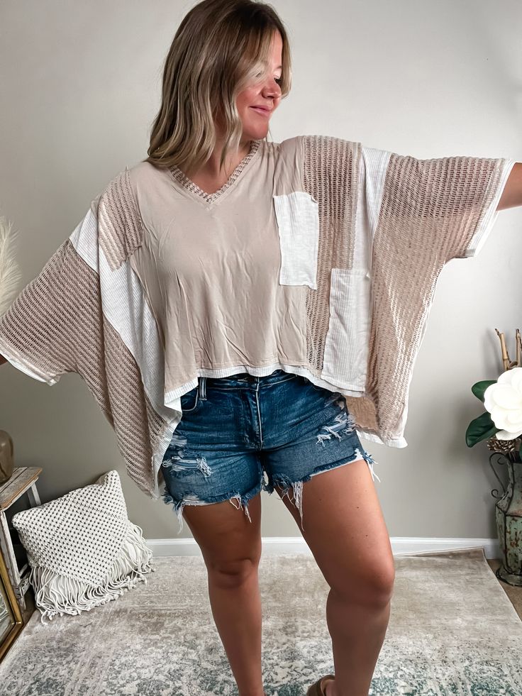 It's the care-free look you've been searching for! Made of a lightweight material and contrast details, this top is made with our texture-loving queens in mind! Get ready for playful patchwork, monochromatic colorways, ribbing, and crochet elements - this piece is truly one-of-a-kind! Fits oversized; Bethany is 5'4" 175lb and wearing a medium.AVAILABLE IN MORE COLORS!Pair it with one of our Basic Tanks or bramis!Complete the look with our Alaina Denim Shorts, Blowout Platform Sandals. and Rhinestone Cross Necklace. Material: Self - 94% Rayon 6% SpandexContrast - 60% Polyester 30% Rayon 10% Spandex Oversized Patchwork Tops For Layering, Beige Patchwork Tops For Summer, White Waffle Knit Tops For Summer, Beige Patchwork Tops With Relaxed Fit, Beige Patchwork Top With Relaxed Fit, Casual Beige Patchwork Tops, Beige Relaxed Fit Patchwork Tops, Textured Top For Spring Layering, Beige Patchwork Top For Fall