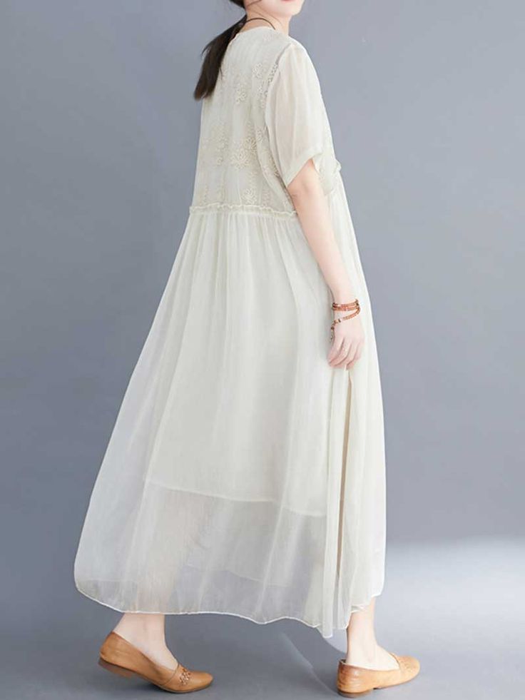 This Embroidered Silk Round-Neck A-Line Dress is the perfect choice for a summer or spring day. Made of 51% to 70% silk. it is lightweight and comfortable to wear. The round neck and regular sleeve length make it easy to style for any occasion. The embroidered detail adds a touch of elegance. The dress is available in black. apricot. white. pink. and lake-green. Size Details: CM TO INCFit For ( XS / S / M / L ) Length 119 Bust 106 Shoulder 39 Sleeve 22 Length 120 Bust 110 Shoulder 40 Sleeve 23 Length 121 Bust 114 Shoulder 41 Sleeve 24 Length 122 Bust 118 Shoulder 42 Sleeve 25 Silk Dresses Short, Dresses Short Sleeve, Silk Dress Short, Silk Dresses, Comfortable Room, Asymmetrical Design, Dresses Short, Spring Day, Affordable Clothes