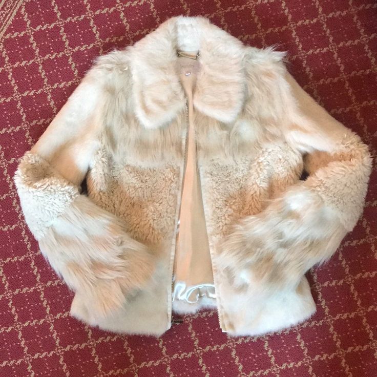 Fun Jacket For The Winter Vintage White Outerwear For Fall, Elegant Cream Fur Coat For Spring, Fitted Cream Fur Coat For Fall, Cream Fur Coat With Faux Fur Trim For Spring, Cream Fitted Fur Coat For Fall, Fitted White Fur Coat For Spring, Classic White Fur Coat For Winter, White Long Sleeve Fur Coat For Spring, Fitted Off-white Outerwear For Fall