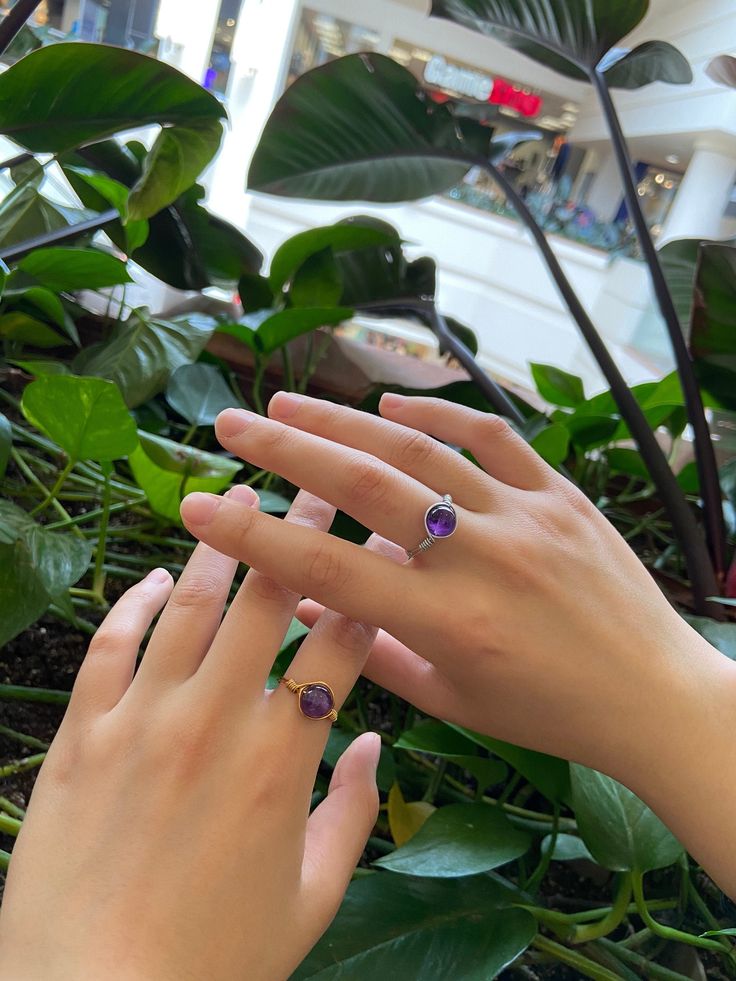 This wire wrapped amethyst ring is hand crafted and made to order. It is very light weight and is made with a natural bead. Amethyst controls evil thoughts, helps sobriety and helps overall control of one's thoughts and mindfulness. It is used to protect against guilty and fearful feelings, along with a protection from witchcraft. Protection From Witchcraft, Evil Thoughts, Amethyst Gem, Les Sentiments, Amethyst Ring, Natural Beads, Rings Statement, Wire Wrapped, Wire Wrapping