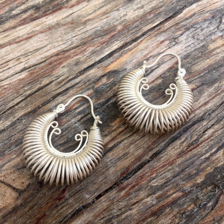 Handcrafted sterling silver hoops earrings made by Balinese artisans Approximate dimensions ; L 1 X W 0.85 Silver Hoops Earrings, Hoops Earrings, Sterling Silver Hoop Earrings, Sterling Silver Hoops, Balinese, Silver Hoops, Silver Hoop Earrings, Wire Jewelry, Crochet Earrings