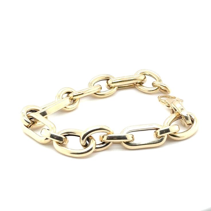 A stunning 14k yellow gold bracelet with large links that exudes timeless elegance and modern style. Its alternating oval and round links create a captivating design that catches the eye. Crafted with a hollow construction, this bracelet offers a big, bold look without the hefty weight, making it an excellent value for the money. The XL lobster clasp ensures a secure and convenient closure, making it easy to put on and take off. With a length of 7.5 inches, this bracelet is designed for a classi Modern Yellow Gold Bracelet With Chunky Chain, Modern Yellow Gold Chunky Chain Bracelet, Modern Oval Link Chain Bracelet For Formal Events, Modern Gold Chain Link Bracelet, Modern Gold Bracelet With Oval Cable Chain, Modern Gold Link Bracelet, Formal Oval Link Chunky Chain Bracelet, Formal Chunky Chain Oval Link Bracelet, Formal Chunky Chain Bracelet With Oval Links