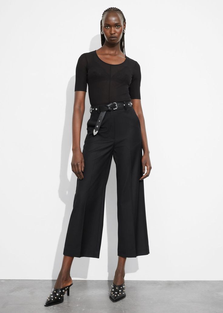 Tailored high-waist trousers with a cropped silhouette. Featuring press creases.• Belt loops• Zip fly with hook and bar closure• Duo slanted side pockets• Duo back pockets• Length of inseam:68.5cm / 27" (EU 36 / UK 8 / US 4) Fitted Cropped Bottoms For Formal Occasions, Fitted Cropped Office Bottoms, Fitted Cropped Bottoms With Pockets, Fitted Cropped Bottoms For Office, Chic Fitted Culottes For Work, Chic Cropped Bottoms With Pockets, Belted Bottoms For Spring Night Out, Spring Belted Bottoms For Night Out, Spring Night Out Belted Bottoms