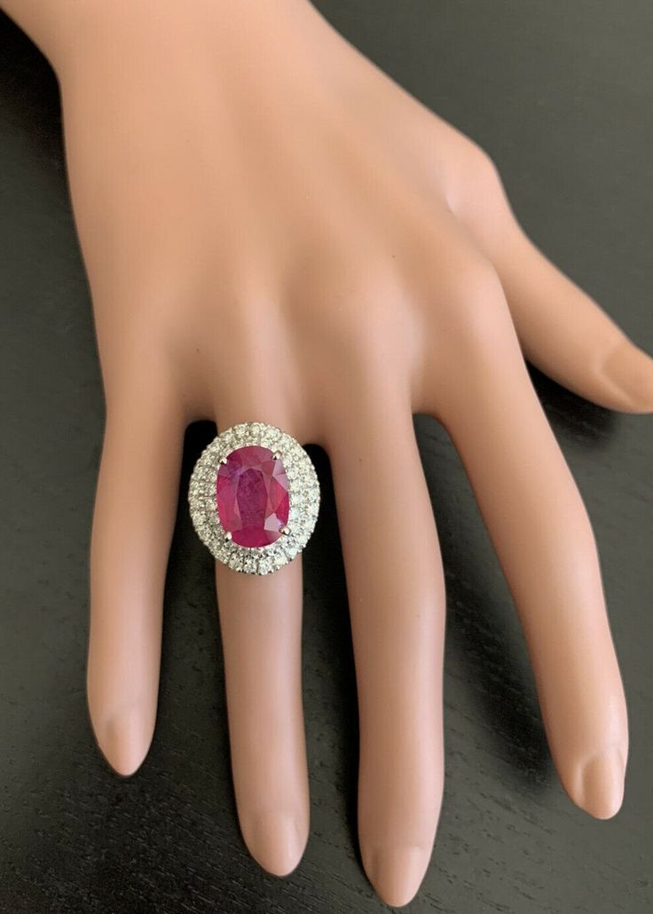 13.50 Carats Lab Created Ruby and Natural Diamond 14K Solid White Gold Ring Suggested Replacement Value $5,500.00 Total Ruby Weight is Approx. : 12.00 Carats Ruby Measures Approx. : 14 x 10mm Natural Round Diamonds Weight: Approx. 1.50 Carats (color G-H / Clarity SI1-SI2) Ring total weight: Approx. 10.0 grams Disclaimer: all weights, measurements and colors are approximate and may vary slightly from the listed dimensions or as seen in the image. All pictures are magnified to show the smallest of Luxury Gia Certified White Gold Ruby Ring, Gia Certified Fine Jewelry Ruby Ring In Platinum, Gia Certified Platinum Ruby Ring In Fine Jewelry, Gia Certified Platinum Ruby Ring, Gia Certified Oval Collectible Ring, Gia Certified Luxury Diamond Ring For Collectors, Exquisite Gia Certified Ruby Diamond Ring, Gia Certified Luxury Pear-shaped Jewelry, Luxury Gia Certified Collectible Diamond Ring