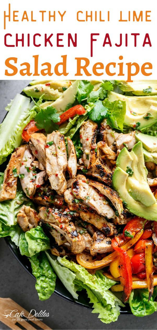 chicken fajita salad with lettuce, peppers and avocado on the side