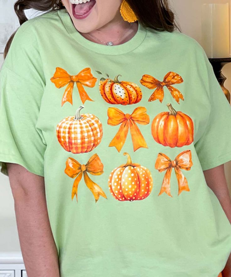 Introducing our "Pumpkins And Bows Graphic Shirt," a charming and stylish choice for the pumpkin season. Available in sizes YXS through 5XL and in various styles including short sleeve, long sleeve, and sweatshirt, this shirt features a delightful design of pumpkins adorned with cute bows, perfect for the girly girl who loves fall.
Crafted from high-quality, soft materials, this shirt ensures all-day comfort, making it ideal for fall festivities, pumpkin patch visits, or casual outings during th Fall Festivities, Pumpkin Season, Pumpkin Seasoning, Autumn Season, Fall Festival, Cute Bows, Graphic Shirt, Fall Wardrobe, Girly Girl