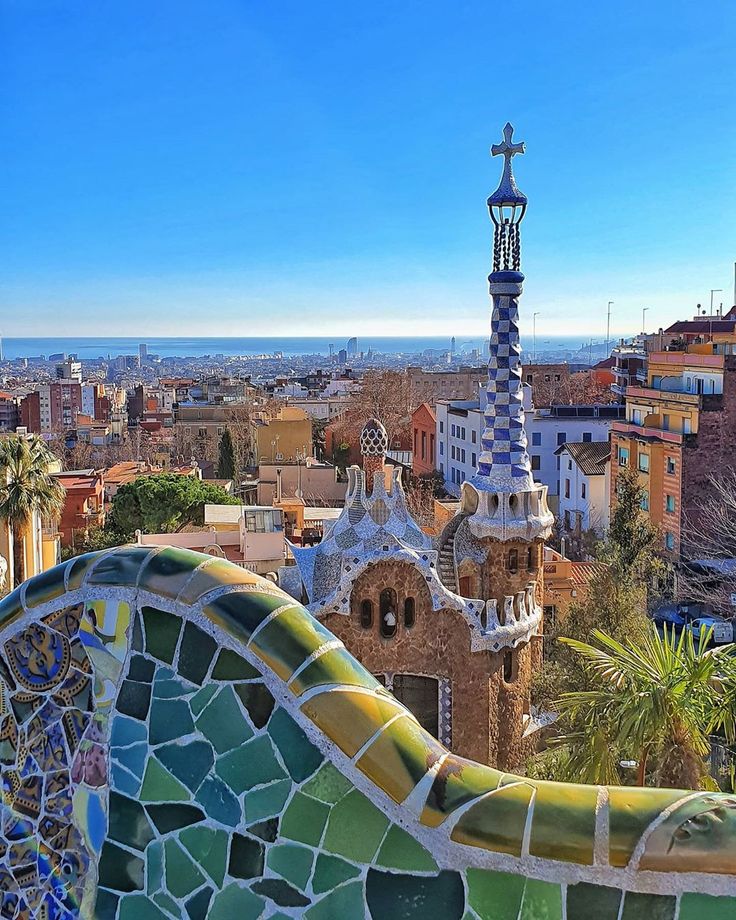 an artisticly designed roof top in barcelona, spain with the city's skyline in the background