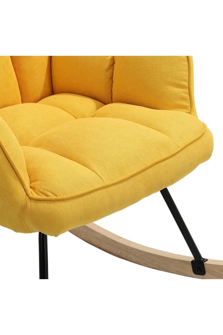 a yellow rocking chair with black legs