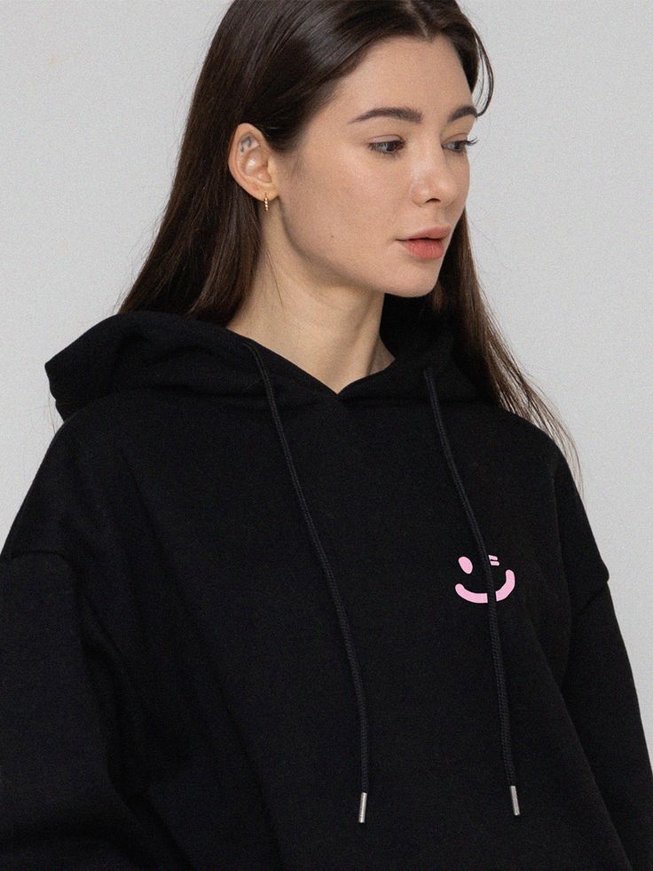 Editor's NotesIt's easy to wear, comfortable hoodie with design point of minimal and cute GRAVER logo smile print on the chest. - Ribbed cuff and hem- Woven logo label on the hem- Unisex item- Front chest graphic printMeasurements(in.)S/M/L/XL- Length: 25.59 in. / 27.17 in. / 28.35 in. / 29.53 in.- Shoulder: 22.05 in. / 23.23 in. / 24.41 in. / 25.98 in.- Chest: 22.44 in. / 24.02 in. / 25.2 in. / 26.38 in.- Sleeve Length: 21.65 in. / 22.83 in. / 23.62 in. / 24.41 in.Model info: Male - Height 5'11, Wearing size XL / Female - Height 5'7, Wearing size MComposition & Care- Cotton 60% Polyester 40%- Dry clean recommendedDesigner- by GRAVER Trendy Everyday Hoodie With Ribbed Cuffs, Basic Black Hoodie With Relaxed Fit, Black Basic Hoodie With Relaxed Fit, Comfortable Black Hoodie With Relaxed Fit, Black Relaxed Fit Basic Hoodie, Comfortable Black Relaxed Fit Hoodie, Trendy Everyday Tops With Drawstring Hood, Black Athleisure Hoodie For Everyday, Black Double-lined Hooded Top For Loungewear