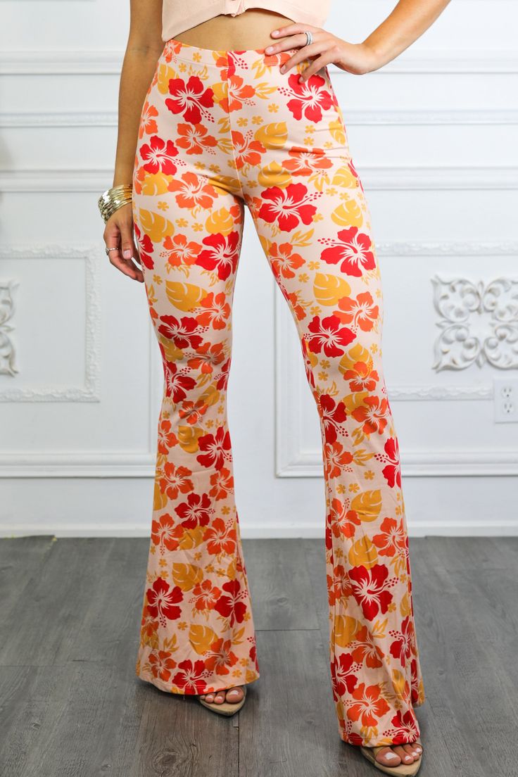 Fashion-forward floral fans, rejoice! Our Floral Arrangement Bell Bottoms provide the perfect blend of statement-making style and comfy-cozy coziness. These bell bottoms boast buttery-soft fabric that'll feel like a breath of fresh air in any wardrobe. Take a 'flower' out of our book - get your hands on a pair today! Paired with our APRICOT SLEEVELESS BUTTON UP CLOSURE SWEATER TOP Model is 5’4 wearing a size small and in 3 1/2 inch heels Harem Jumpsuits, Comfy Sets, A Breath Of Fresh Air, Navy Midi Dress, Breath Of Fresh Air, Midi Shirt Dress, Comfy Cozy, Floral Arrangement, Top Model