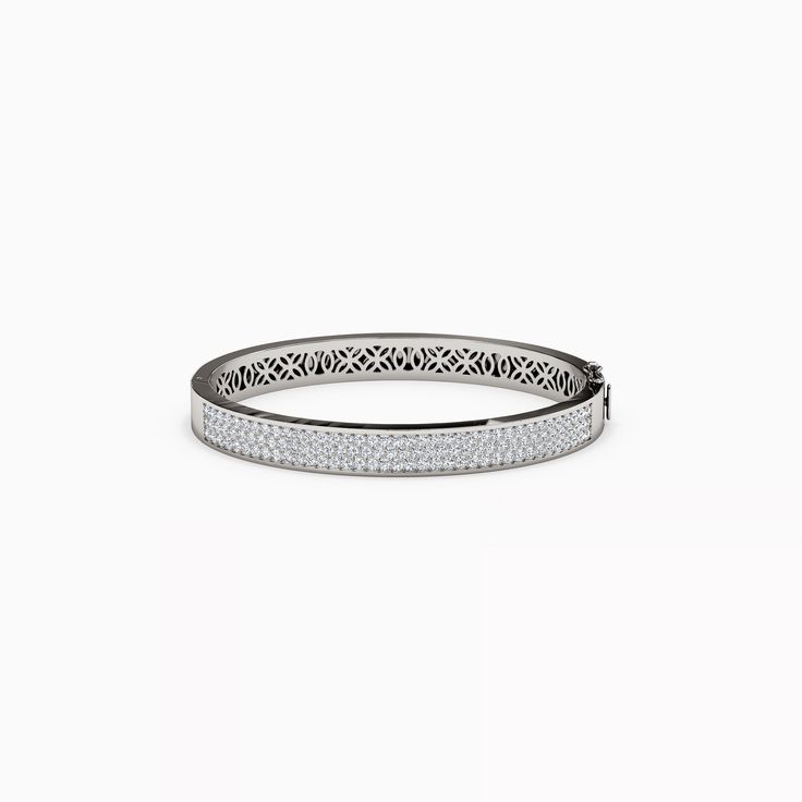 The meticulously crafted floral detailing on the metalwork offers a glimpse into a secret world of shimmering diamonds. Rare Diamonds, Diamond Bangle Bracelet, Crystal Structure, Light Shadow, Diamond Bangles Bracelet, Vs Diamond, Diamond Bangle, Bangle Bracelet, Metal Working