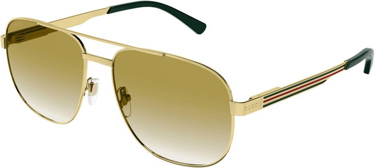 A 90s vintage twist characterizes this full metal caravan shape with web detail on the temples. The style comes with two skus with or without enamel which give to the style a strong brand recognizability. The style is characterized by exclusive Gucci patented Flex hinge. Retro Metal Sunglasses With Gradient Lenses, Gucci Gold Sunglasses For Summer, Gucci Gold Tinted Sunglasses, Gucci Gold Aviator Sunglasses, Gucci Gold Sunglasses With Gradient Lenses, Gucci Aviator Sunglasses In Gold, Classic Metal Sunglasses With Mirrored Lenses, Gucci Gold Sunglasses With Uv Protection, Vintage Gucci Sunglasses With Tinted Lenses