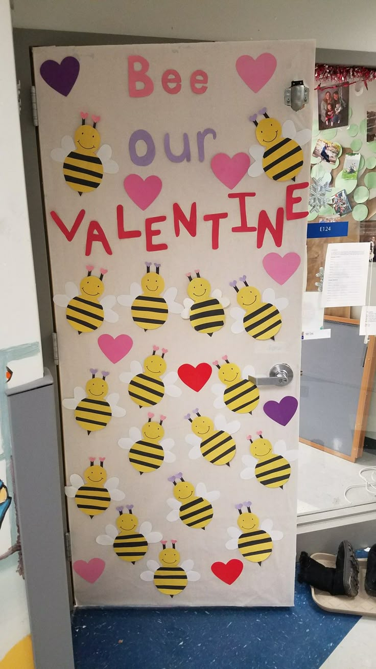 a door decorated with hearts and bees for valentine's day