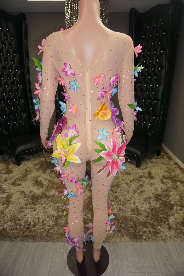 It's giving tropical vibes! This beautiful bodysuit dress features silver stones and large, bright colored faux flowers that cover up the breasts and lower have for the right amount of coverage. There's a zipper up in the back to get into the piece easier. Mesh is stretchy but it's best to order true to size. Item cannot be customized. Materials might change depending on inventory, but never enough to alter the overall look of the design. *Handle garment with care, to be worn delicately. Island Breeze, Bodysuit Dress, Jumpsuit Jacket, Leggings Sale, Bright Colored, Maxi Gowns, Bustier Top, Tropical Vibes, Crop Top Blouse