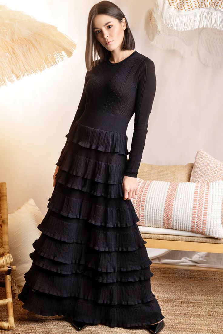 Obsessing over the SS24 Black Knit Detailed Layered Dress! Each layer adds drama to this knit masterpiece, perfect for making a grand entrance. It's chic, it's elegant, it's everything! Ready to reign as the queen of style? 🖤 #MunFashion #LayeredLuxe #KnitEnchantment #DramaticEntrance #ChicQueen #ElegantAffair #FashionRoyalty #StyleSovereign #KnitCouture #LuxeLayers Evening Tiered Dress With Layered Hem, Tiered Evening Dress With Layered Hem, Chic Black Layered Dress, Chic Layered Fitted Dress, Chic Layered Tiered Ruffle Dress, Chic Fitted Layered Dress, Chic Layered Fitted Maxi Dress, Chic Layered Fitted Mini Dress, Chic Layered Tiered Skirt Dresses