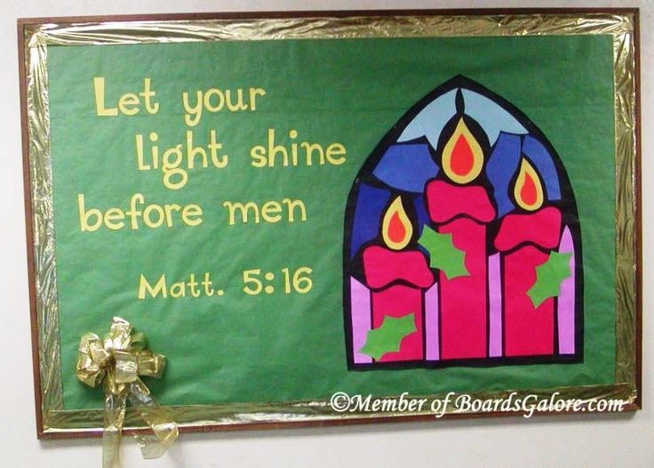 a bulletin board with candles on it that says let your light shine before men mat