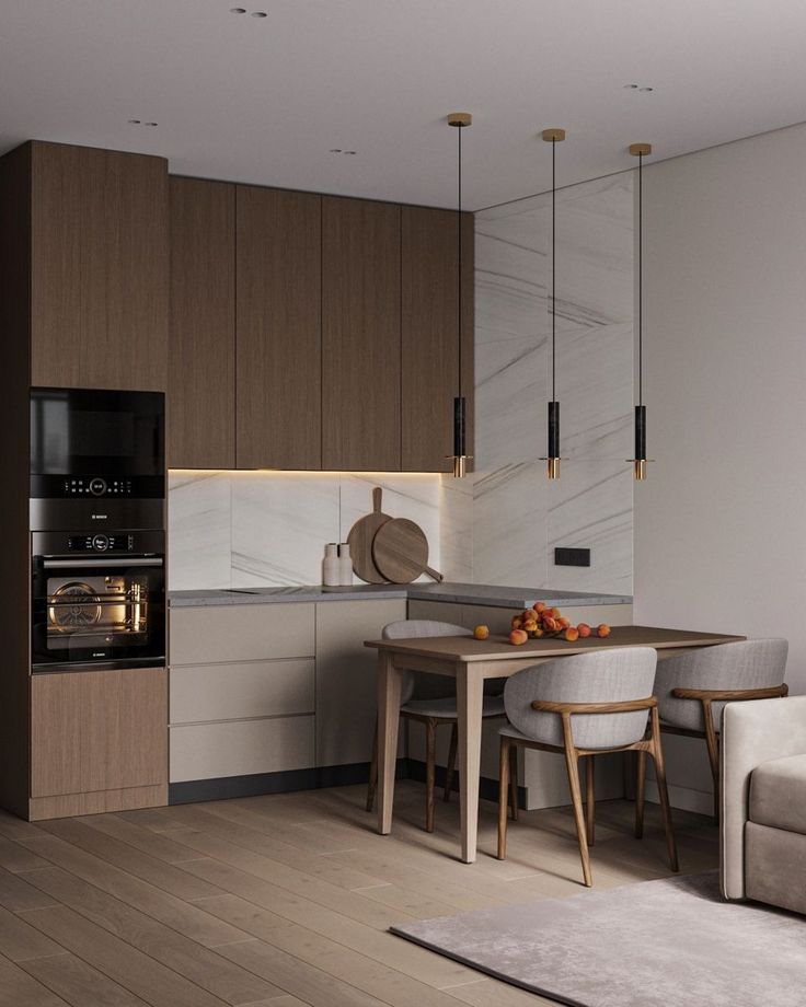 the kitchen is clean and ready to be used as a dining room or living room