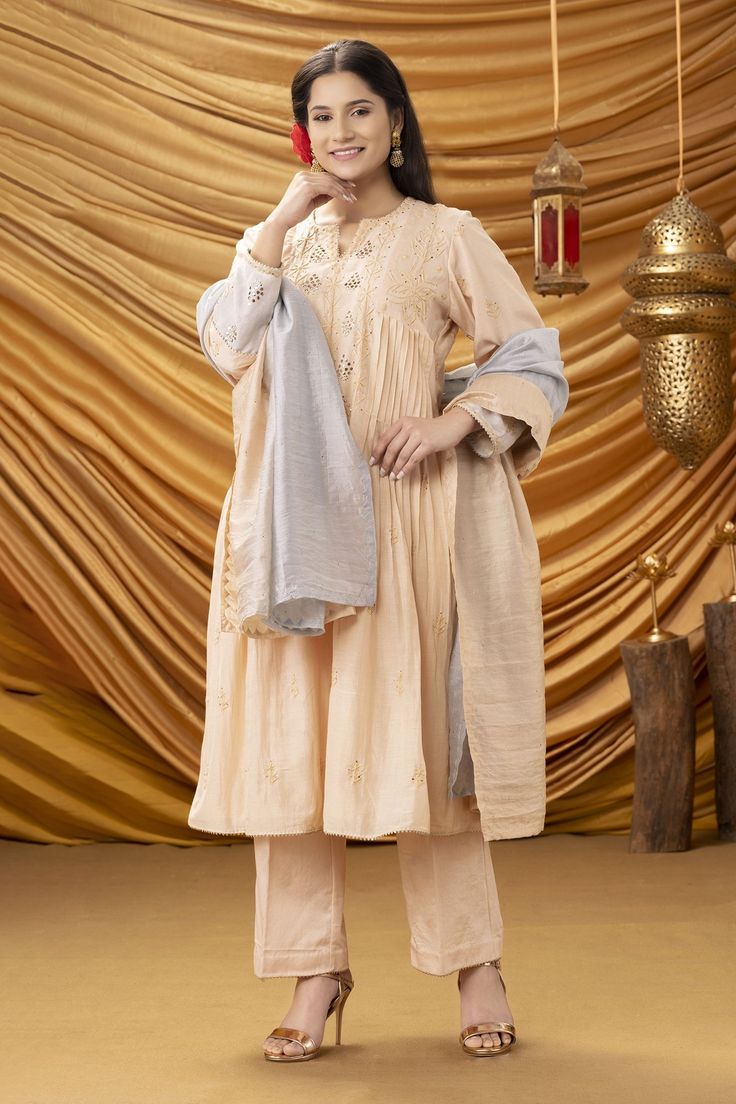 Peachish beige mulmul A-line kurta with pleats and ombre shaded sleeves with intricate hand embroidered chikankari in badla and mukaish work. Paired with pant and ombre dupatta.
Component: 3
Pattern: Embroidered
Type Of Work: Chikankari, Badla, Mukaish
Neckline: Notched
Sleeve Type: Full Sleeves
Fabric: Kurta-Mulmul and Dupatta-Organza     
Color: Peach,Beige
Other Details: 
A-line kurta
Shaded sleeves
Occasion: Puja - Aza Fashions Ombre Dupatta, Chikankari Kurta Set, Mukaish Work, Chikankari Kurta, Kurta Set For Women, Types Of Work, A Line Kurta, Fashion App, Kurta Set