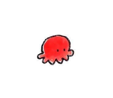 an octopus sticker sitting on top of a white surface next to a red object