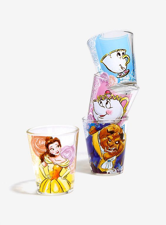 three plastic cups with disney characters on them, one is empty and the other has an image of beauty and the beast