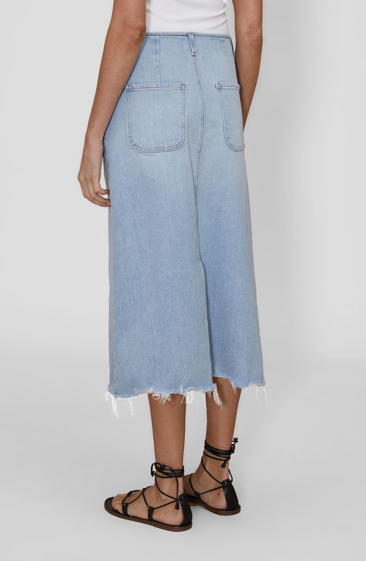 Front patch pockets bring throwback charm to this longline skirt that's cut for comfort from Italian stretch denim. 31" length (size medium) Unlined 98% cotton, 2% elastane Machine wash, tumble dry Made in the USA of imported fabric Wide Leg Denim Skirt With Frayed Hem, High Rise Relaxed Cotton Skirt, Wide Leg Skirt With Pockets In Medium Wash, Wide Leg Medium Wash Skirt With Pockets, High Rise Relaxed Denim Blue Skirt, Spring Denim Skirt With Patch Pockets, Mid-rise Denim Skirt With Pockets, Casual Denim Skirt With Five Pockets, Dark Wash Knee-length Bottoms With Frayed Hem