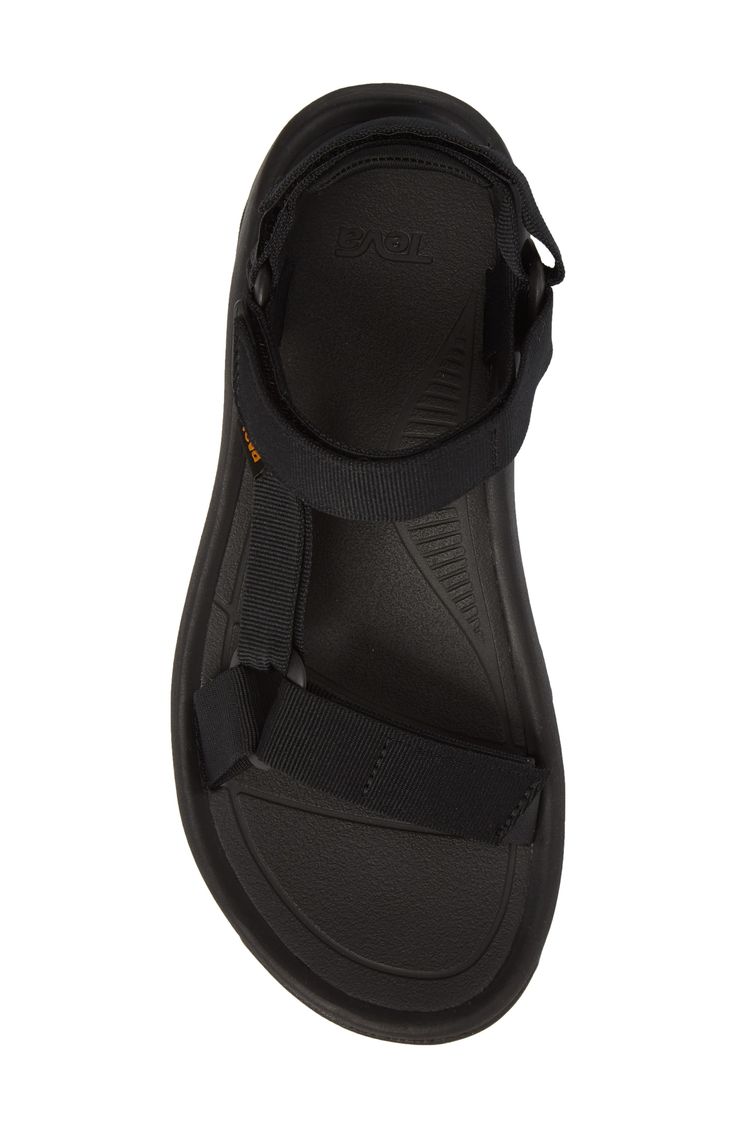 Adjustable hook-and-loop straps mean a custom fit in a water-ready sandal featuring a shock pad and padded heel for additional cushioning. Adjustable straps with hook-and-loop closure Cushioned footbed Textile upper/ textile and synthetic lining and sole Imported Men's Shoes Black Slides With Adjustable Strap, Black Double Strap Synthetic Sport Sandals, Black Synthetic Double Strap Sport Sandals, Black Sporty Sandals With Adjustable Strap, Black Waterproof Functional Sandals, Waterproof Open Toe Sport Sandals, Adjustable Open Toe Sport Sandals, Functional Sandals With Adjustable Strap, Black Adjustable Functional Sandals