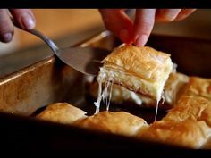 a person cutting into some food with a knife