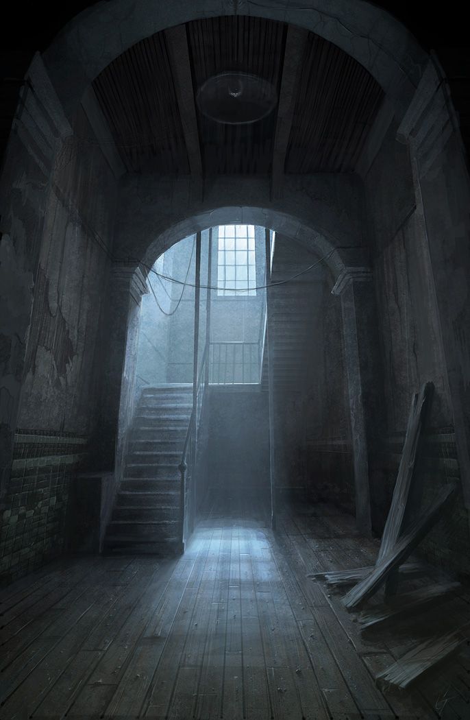 an empty room with stairs and light coming from the window at the end of the hallway