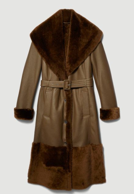 Women's Fur Sheepskin Leather Trench Coat In Dark Brown Stay warm and stylish in this Women's Fur Sheepskin Leather Coat. Crafted from real sheepskin leather with a semi-aniline finish, it features a luxurious faux shearling inner lining, a fur collar, and open hem cuffs with fur accents. With a button closure and ample pockets, this dark brown coat combines comfort and elegance seamlessly. Outer Shell: Real Leather Leather Type: Sheepskin Leather Finish: Semi-aniline Inner Shell: Faux Shearling Feature: Big Elegant Fur Collar, Belted Waist Closure Style: Button Collar Style: Fur Collar Cuffs Style: Open Hem With Fur Inside Pockets: One Outside Pockets: Two Side Pocket Color: Dark Brown Vintage Leather Trench Coat, Leather Overcoat, Lydia Millen, Leather Gifts For Her, Leather Shorts Women, Short Leather Skirts, Leather Coat Womens, Leather Jumpsuit, Shearling Vest