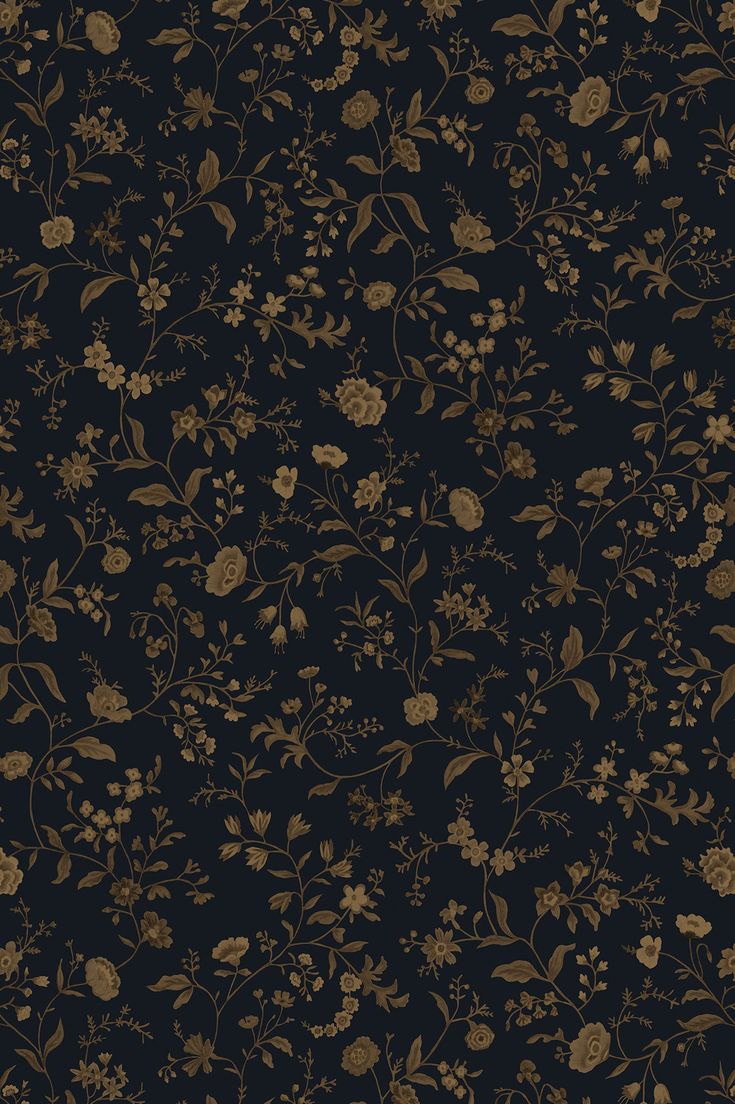 a black and gold wallpaper with flowers on it's side, in the dark