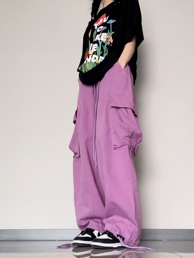 Embrace the Y2K streetwear vibes with our Acubi Wide Leg Baggy Track Pants. These streetwear essentials provide a relaxed fit, drawstring waist, and ample pockets, creating a fashionable and comfortable look. Baggy Track Pants, Parachute Cargo Pants, Streetwear Cargo Pants, Parachute Cargo, Camo Jeans, Streetwear Essentials, Blue Vests, Baggy Pant, Fitted Trousers