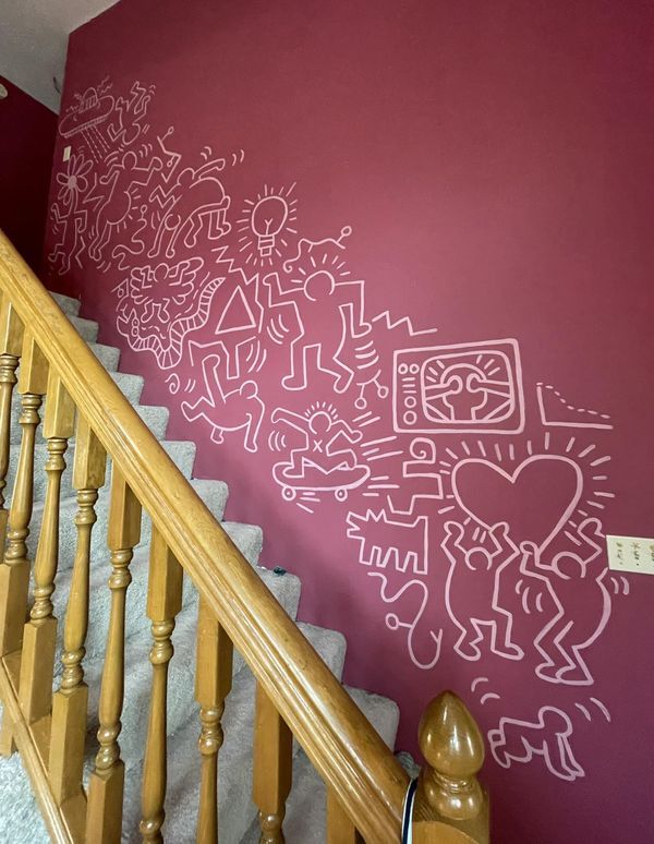 the stairs are painted with white chalk and have hearts drawn on them, along with other doodles