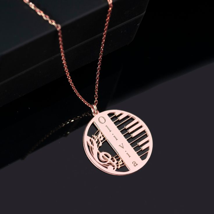 "Custom Music Note Necklace, Personalized Music Pendant, Music Lover Gift, Musician Gift, Treble Clef Pendant, Piano Jewelry, Note Charm TO OUR VALUED CUSTOMERS ! Please take a look at our special catalog that we have prepared for you !  ▶ https://www.etsy.com/shop/DaintyMark D E T A I L S * Made to Order. * Handmade with Sterling %100 925K Sterling Solid Silver. * Choice of Gold Color: Gold, Rose Gold, Silver * Length: 14\", 16\", 18\", 20\", 22\"  * Ready to Ship in 1-3 Business Days * Free returns within 14 days from the order date. A B O U T ∙ U S * All personalization is done by hand. Because it's better that way. * 100% Ethically Sourced raw materials. * Our lovely packaging is made with love and passion. * Handcrafted by our trusted craftsmen with care. G I F T ∙ T I M E We love gif Piano Jewelry, Music Pendant, Music Note Necklace, Musician Gifts, Treble Clef, Music Note, Gift For Music Lover, Cool Necklaces, Fantasy Jewelry